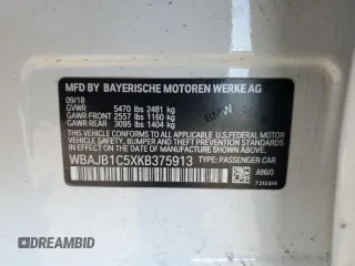 2019 BMW 5 Series 530e xDrive z VIN WBAJB1C5XKB375913, wystawiony jako Copart lot #82580004 z przebiegiem Nie podano mil oraz Szkoda całkowita • Salvage title. Historia ofert i sprzedaży dostępna na DreamBid. Obrazek 14.