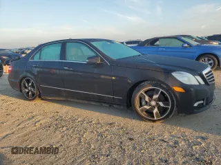 2010 Mercedes-Benz E-Class E 550 Luxury with VIN WDDHF9AB0AA257716, listed as a Copart auction lot 74117034 with 0 mi miles and Salvage Title. Bid and sale history available at carsss.com. Image 4.