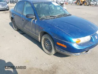 2002 Saturn SL z VIN 1G8ZG52832Z141611, wystawiony jako IAAI lot #42409942 z przebiegiem Nie podano mil oraz . Historia ofert i sprzedaży dostępna na DreamBid. Obrazek 1.