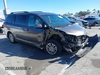 2015 Toyota Sienna XLE with VIN 5TDYK3DC6FS689437, listed as a IAAI auction lot 41774120 with 112,259 mi miles. Bid and sale history available at carsss.com. Image 1.