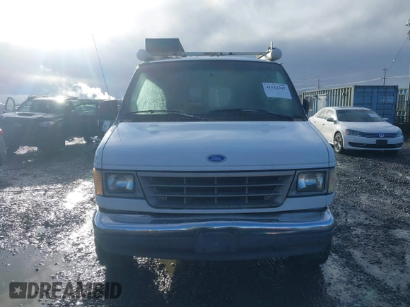1992 Ford Econoline Cargo with VIN 1FTHS24H5NHB42507, listed as a IAAI auction lot 41512347 with 373,987 mi miles and . Bid and sale history available at DreamBid. Image 12.