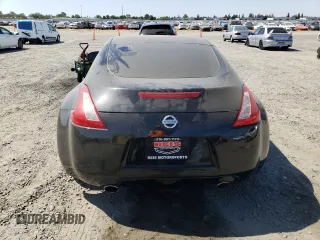 2011 Nissan 370Z Touring z VIN JN1AZ4EHXBM553057, wystawiony jako Copart lot #58557165 z przebiegiem 110 714 mil mil oraz Szkoda całkowita • Salvage title. Historia ofert i sprzedaży dostępna na DreamBid. Obrazek 6.