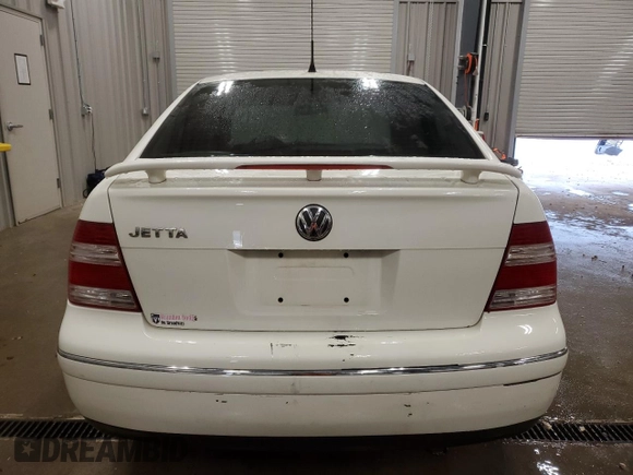 2004 Volkswagen Jetta GL with VIN 3VWRK69M54M098422, listed as a Copart auction lot 44006055 with 115,211 mi miles and Clean title. Bid and sale history available at DreamBid. Image 6.