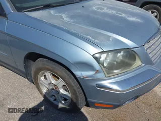 2005 Chrysler Pacifica Touring z VIN 2C4GM68475R330521, wystawiony jako IAAI lot #40612905 z przebiegiem 128 406 mil mil oraz . Historia ofert i sprzedaży dostępna na DreamBid. Obrazek 6.