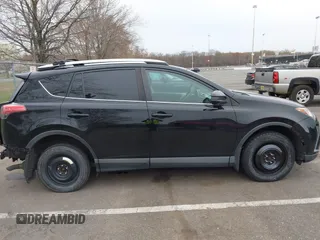 2016 Toyota RAV4 LE with VIN 2T3BFREV3GW447802, listed as a IAAI auction lot 41985438 with 213,247 mi miles. Bid and sale history available at carsss.com. Image 13.