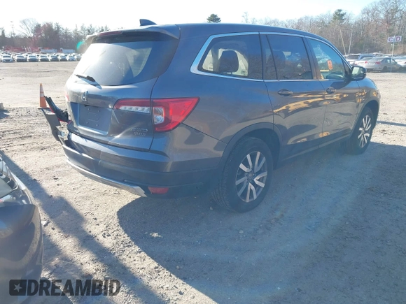 2019 Honda Pilot EX-L with VIN 5FNYF6H5XKB051708, listed as a IAAI auction lot 41270729 with 75,094 mi miles. Bid and sale history available at carsss.com. Image 4.