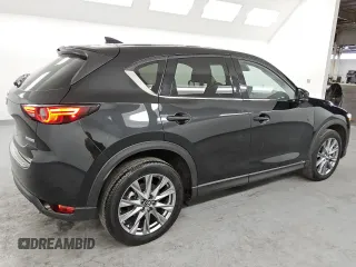 2021 Mazda CX-5 Grand Touring with VIN JM3KFBDM6M0487606, listed as a Copart auction lot 45399655 with 25,241 mi miles and Clean Title. Bid and sale history available at DreamBid. Image 3.