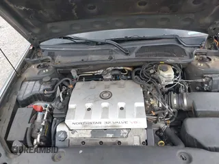 2003 Cadillac DeVille with VIN 1G6KD54Y83U190401, listed as a IAAI auction lot 42122822 with 169,548 mi miles. Bid and sale history available at carsss.com. Image 10.