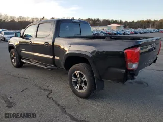 2017 Toyota Tacoma SR5 with VIN 3TMDZ5BN0HM031299, listed as a Copart auction lot 42693615 with 144,135 mi miles and Salvage Title. Bid and sale history available at carsss.com. Image 2.
