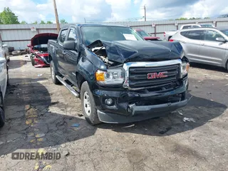 2019 GMC Canyon 2WD z VIN 1GTG5BEN9K1100675, wystawiony jako IAAI lot #42226165 z przebiegiem 100 139 mil mil oraz . Historia ofert i sprzedaży dostępna na DreamBid. Obrazek 1.