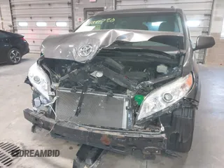 2015 Toyota Sienna LE AAS with VIN 5TDKK3DC6FS652281, listed as a IAAI auction lot 41891750 with 150,162 mi miles. Bid and sale history available at carsss.com. Image 6.