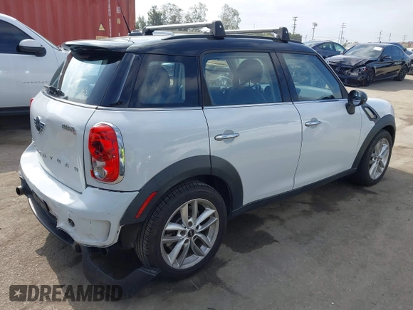 2013 MINI Countryman S with VIN WMWZC3C55DWP24628, listed as a IAAI auction lot 42558387 with 169,269 mi miles and . Bid and sale history available at DreamBid. Image 4.