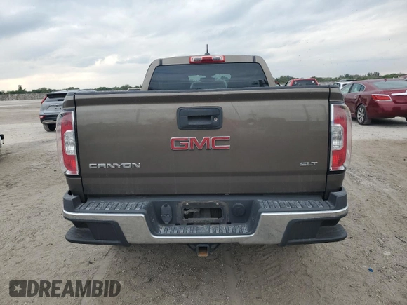 2015 GMC Canyon 2WD SLT with VIN 1GTG5CE31F1118775, listed as a Copart auction lot 45272905 with 119,639 mi miles and Salvage Title. Bid and sale history available at carsss.com. Image 6.