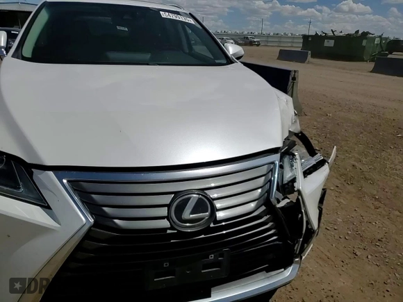 2016 Lexus RX 350 z VIN 2T2BZMCA6GC008254, wystawiony jako Copart lot #54799135 z przebiegiem 109 645 mil mil oraz Szkoda całkowita • Salvage title. Historia ofert i sprzedaży dostępna na DreamBid. Obrazek 14.