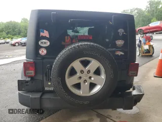 2017 Jeep Wrangler Unlimited Sport with VIN 1C4BJWDG6HL743322, listed as a Copart auction lot 61100045 with 135,959 mi miles and Salvage title. Bid and sale history available at DreamBid. Image 6.