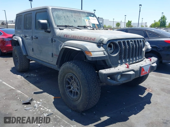 2023 Jeep Wrangler Rubicon with VIN 1C4JJXFG7PW541813, listed as a IAAI auction lot 42640045 with 53,645 mi miles and . Bid and sale history available at DreamBid. Image 12.
