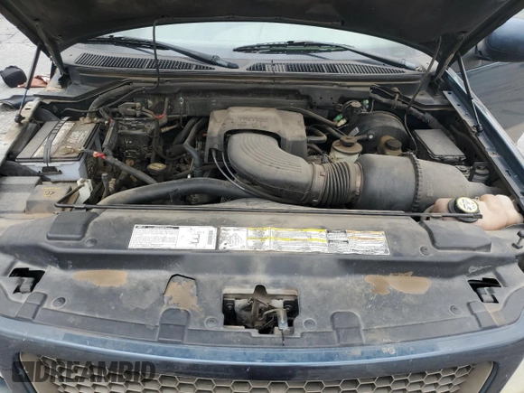 2001 Ford F-150 XLT with VIN 1FTRW07LX1KA18940, listed as a Copart auction lot 50723495 with 133,686 mi miles and Salvage title. Bid and sale history available at DreamBid. Image 12.
