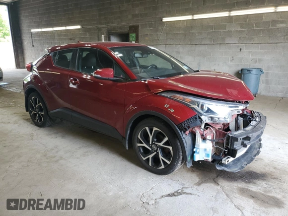 2018 Toyota C-HR XLE with VIN NMTKHMBX7JR032119, listed as a Copart auction lot 61007975 with 100,093 mi miles and Salvage title. Bid and sale history available at DreamBid. Image 4.