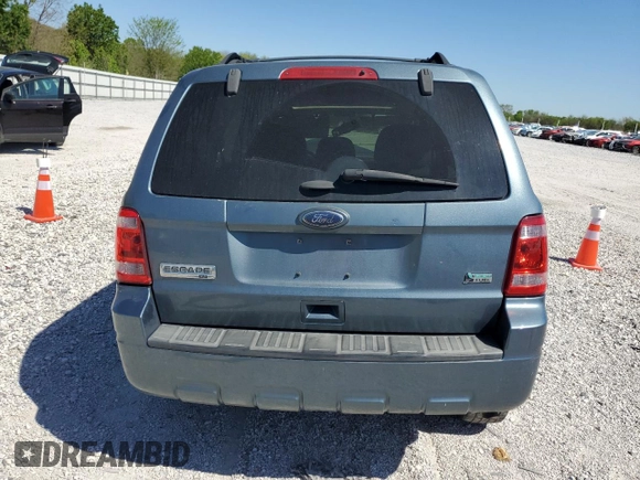 2012 Ford Escape XLT с VIN 1FMCU9DG0CKA93443, выставлен на аукционе Copart как лот 52761705 с пробегом 185 070 миль миль и Списание • Salvage title. История ставок и продаж доступна на DreamBid. Изображение 6.