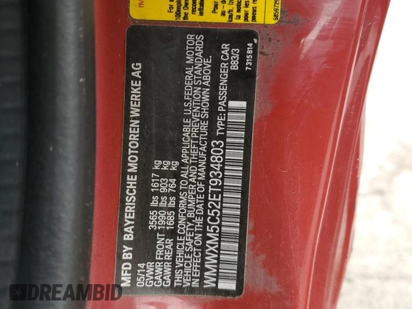 2014 MINI Hardtop with VIN WMWXM5C52ET934803, listed as a Copart auction lot 55284765 with 96,519 mi miles and Salvage title. Bid and sale history available at DreamBid. Image 12.