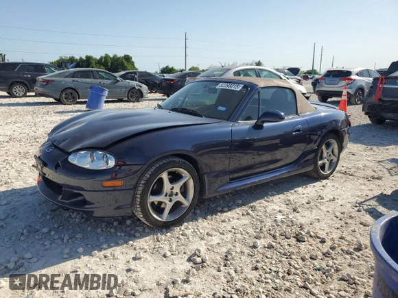 2002 Mazda MX-5 Miata Cloth z VIN JM1NB353720231873, wystawiony jako Copart lot #52398015 z przebiegiem 90 077 mil mil oraz Szkoda całkowita • Salvage title. Historia ofert i sprzedaży dostępna na DreamBid. Obrazek 1.