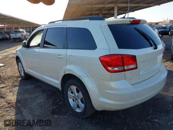 2014 Dodge Journey SE with VIN 3C4PDCAB4ET119412, listed as a IAAI auction lot 41760074 with 148,882 mi miles. Bid and sale history available at carsss.com. Image 3.
