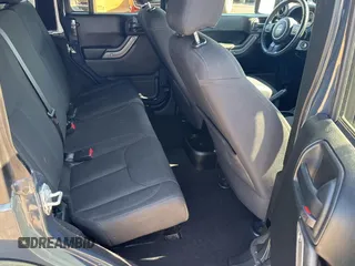 2018 Jeep Wrangler JK Unlimited Sport S with VIN 1C4BJWDG8JL890974, listed as a Copart auction lot 76051434 with 26,581 mi miles and Salvage Title. Bid and sale history available at carsss.com. Image 6.