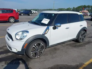 2012 MINI Countryman S with VIN WMWZC3C56CWL82122, listed as a IAAI auction lot 42600474 with 71,920 mi miles and . Bid and sale history available at DreamBid. Image 2.