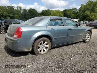 2006 Chrysler 300 with VIN 2C3LA43R26H247041, listed as a Copart auction lot 70334634 with 73,043 mi miles and Salvage Title. Bid and sale history available at carsss.com. Image 3.