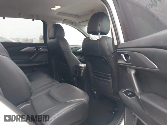 2019 Mazda CX-9 Touring with VIN JM3TCACY2K0328347, listed as a IAAI auction lot 41917854 with 67,173 mi miles and . Bid and sale history available at DreamBid. Image 8.