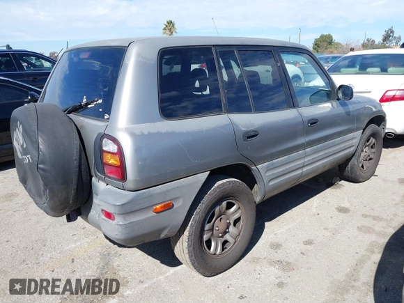 1999 Toyota RAV4 with VIN JT3GP10V0X7050673, listed as a IAAI auction lot 41625555 with 357,682 mi miles and . Bid and sale history available at DreamBid. Image 4.