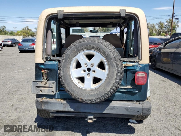1997 Jeep Wrangler SE with VIN 1J4FY29P3VP492935, listed as a Copart auction lot 67607644 with 129,227 mi miles and Salvage Title. Bid and sale history available at carsss.com. Image 6.