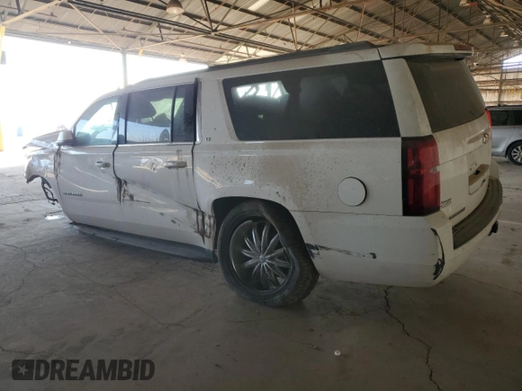 2015 Chevrolet Suburban LT z VIN 1GNSCJKC3FR585391, wystawiony jako Copart lot #88498085 z przebiegiem Nie podano mil oraz Szkoda całkowita • Salvage title. Historia ofert i sprzedaży dostępna na DreamBid. Obrazek 2.