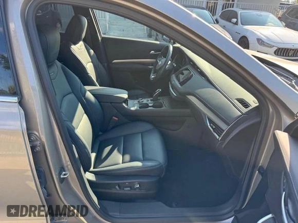 2023 Cadillac XT4 AWD Premium Luxury with VIN 1GYFZDR40PF108407, listed as a Copart auction lot 54799365 with 8,724 mi miles and Non Repairable. Bid and sale history available at carsss.com. Image 7.
