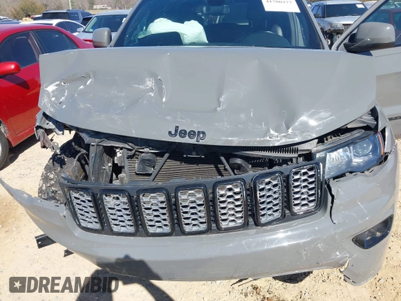 2019 Jeep Grand Cherokee Laredo E with VIN 1C4RJFAG2KC855108, listed as a IAAI auction lot 41780277 with 81,283 mi miles and . Bid and sale history available at DreamBid. Image 6.
