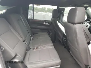 2021 Chevrolet Suburban LS with VIN 1GNSCBKD5MR392512, listed as a Copart auction lot 71238124 with 77,775 mi miles and Salvage Title. Bid and sale history available at DreamBid. Image 11.