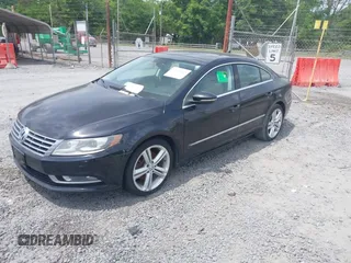 2013 Volkswagen CC Lux with VIN WVWRP7AN2DE525995, listed as a IAAI auction lot 42105042 with 148,818 mi miles. Bid and sale history available at carsss.com. Image 2.