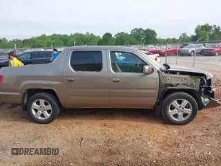 2010 Honda Ridgeline RTL with VIN 5FPYK1F50AB003576, listed as a IAAI auction lot 42050763 with 183,197 mi miles. Bid and sale history available at carsss.com. Image 13.