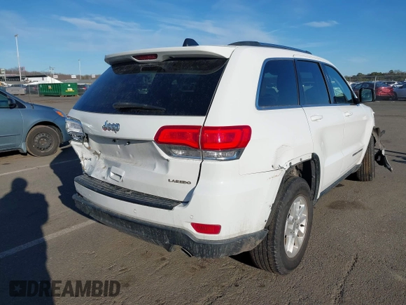2019 Jeep Grand Cherokee Laredo E with VIN 1C4RJFAG7KC694674, listed as a IAAI auction lot 41591678 with 61,144 mi miles. Bid and sale history available at carsss.com. Image 4.