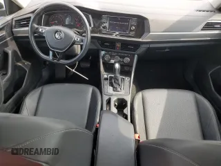 2019 Volkswagen Jetta S z VIN 3VWC57BUXKM162092, wystawiony jako Copart lot #54738875 z przebiegiem 76 838 mil mil oraz Szkoda całkowita • Salvage title. Historia ofert i sprzedaży dostępna na DreamBid. Obrazek 8.