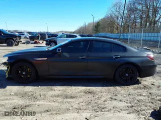 2016 BMW 6 Series 640i xDrive with VIN WBA6D2C50GGT66167, listed as a IAAI auction lot 41599759 with 105,108 mi miles. Bid and sale history available at carsss.com. Image 15.