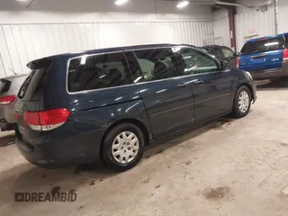 2009 Honda Odyssey LX z VIN 5FNRL38229B042383, wystawiony jako IAAI lot #42080457 z przebiegiem 195 653 mil mil oraz . Historia ofert i sprzedaży dostępna na DreamBid. Obrazek 4.