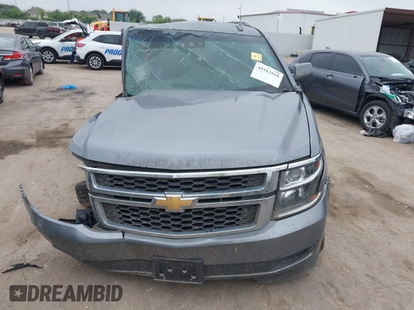 2020 Chevrolet Tahoe LS z VIN 1GNSCAKC3LR101733, wystawiony jako IAAI lot #41912918 z przebiegiem 153 731 mil mil oraz . Historia ofert i sprzedaży dostępna na DreamBid. Obrazek 12.