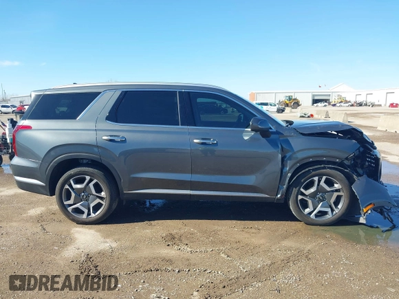 2024 Hyundai Palisade Limited z VIN KM8R54GE6RU762168, wystawiony jako IAAI lot #41636936 z przebiegiem 12 236 mil mil oraz . Historia ofert i sprzedaży dostępna na DreamBid. Obrazek 13.
