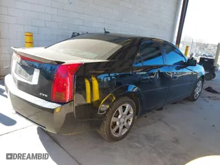 2006 Cadillac CTS with VIN 1G6DP577360126880, listed as a IAAI auction lot 41529325 with 137,656 mi miles. Bid and sale history available at carsss.com. Image 4.