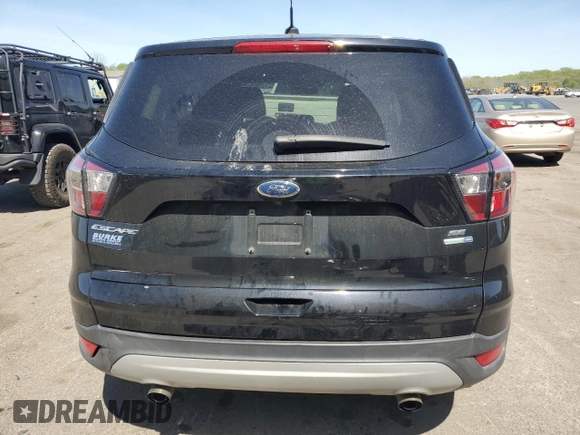 2017 Ford Escape SE with VIN 1FMCU9GD6HUD47962, listed as a Copart auction lot 55059695 with 118,367 mi miles and Salvage Title. Bid and sale history available at DreamBid. Image 6.
