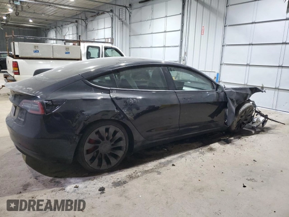 2022 Tesla Model 3 Performance with VIN 5YJ3E1EC7NF104209, listed as a Copart auction lot 86266344 with 77,335 mi miles and Salvage Title. Bid and sale history available at DreamBid. Image 3.