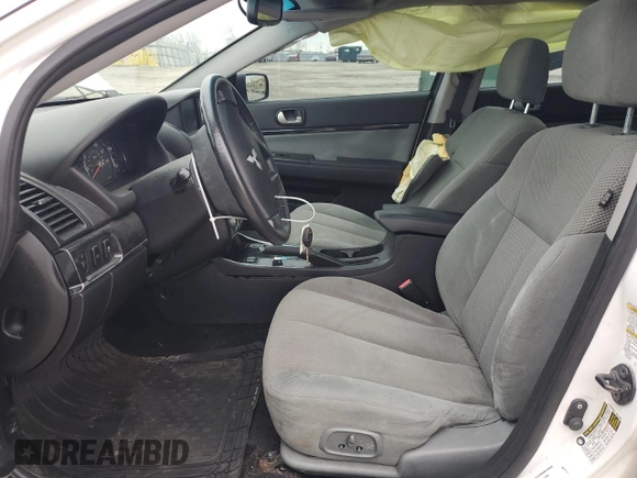 2012 Mitsubishi Galant ES z VIN 4A32B3FF5CE011838, wystawiony jako Copart lot #51344155 z przebiegiem 229 557 mil mil oraz Szkoda całkowita • Salvage title. Historia ofert i sprzedaży dostępna na DreamBid. Obrazek 7.