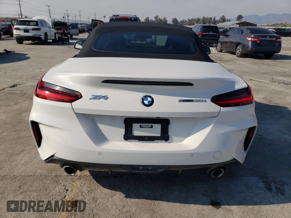 2023 BMW Z4 sDrive30i with VIN WBAHF3C06PWY01020, listed as a Copart auction lot 43236464 with 6,860 mi miles. Bid and sale history available at carsss.com. Image 6.