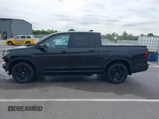 2023 Honda Ridgeline Black Edition with VIN 5FPYK3F86PB015746, listed as a IAAI auction lot 42311862 with 40,181 mi miles and . Bid and sale history available at DreamBid. Image 15.